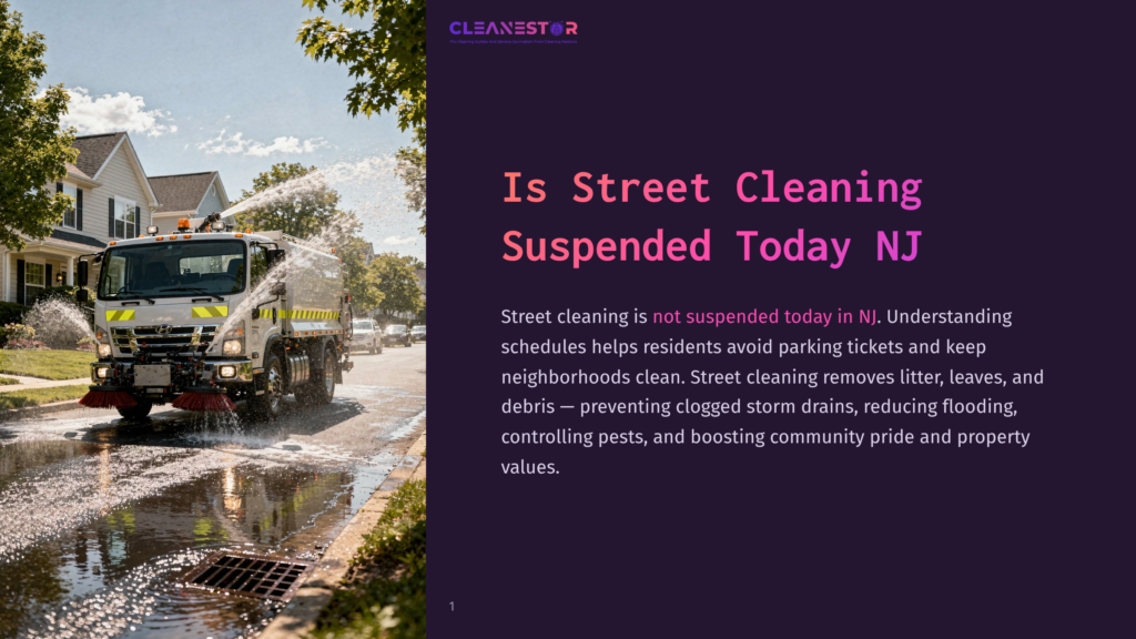 A Street Cleaning Truck Sprays Water Onto A Residential Street In New Jersey, Washing Away Debris. The Truck Is White With Orange Accents, And The Street Is Wet And Reflective, With Houses And Trees In The Background.